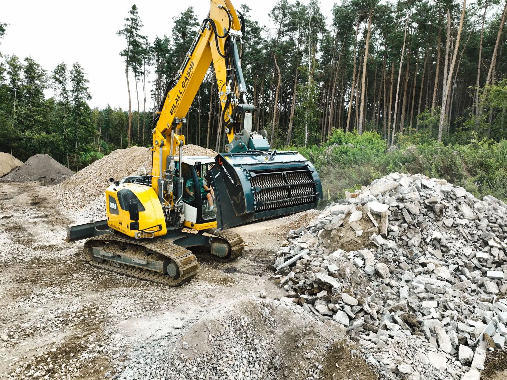 Bagger mit Sieblöffel